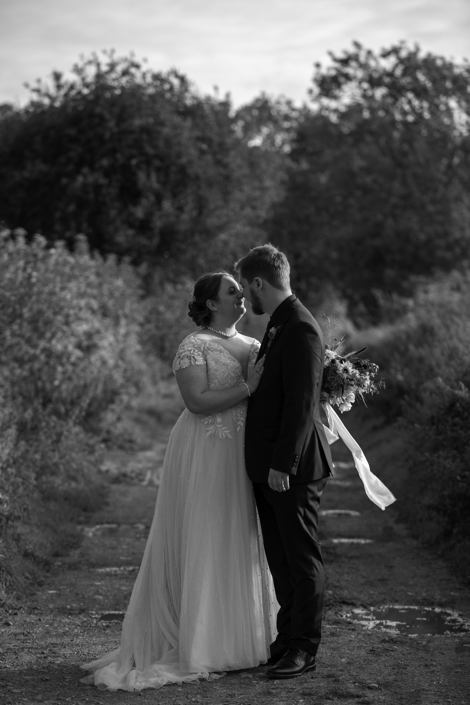 bride and groom, wedding couple at Sullington Manor Farm, West Sussex, RH20 4AE. Farm wedding inn South Downs