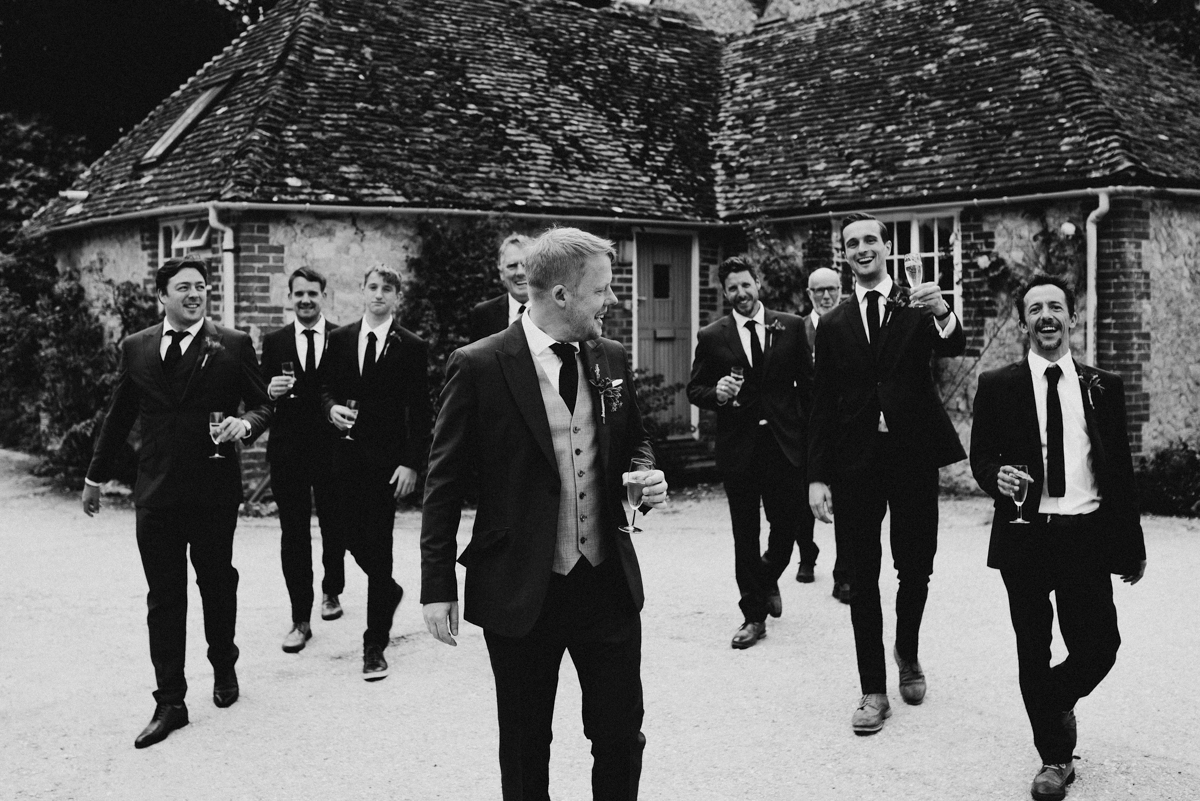 groom and groomsmen at barn wedding at Sullington Manor Farm, West Sussex, RH20 4AE. Farm wedding with accommodation in South Downs.